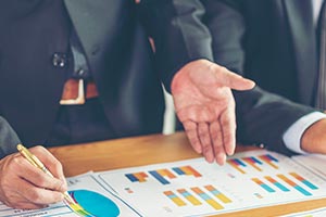 Executives looking at data