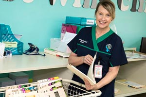Nurse looking at files