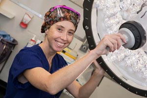 Nurse holding theatre lamp
