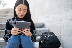 Young woman looking at a tablet