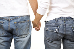 Two people holding hands